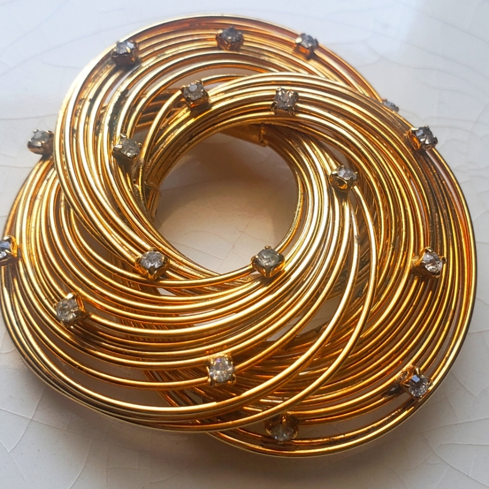 Cosmic mid century modern wired wrapped rhinestone studded brooch